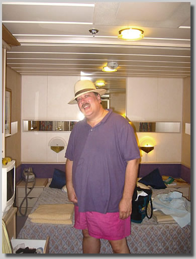 Gush posing in the middle of our cabin, #4463 on deck 4 in his new hat