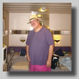 Gush posing in the middle of our cabin, #4463 on deck 4 in his new hat