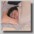 Ruthie all snuggled up in bed in cabin 4463 on deck 4. This was while I was away arranging for the video man for my marriage proposal that was in about an hour. It was just about the only part of this 7-day cruise that we were apart for any length of time.