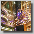 This is a view of the Centrum, which was a 7-story atrium in the center of the ship. This view is from deck 4 looking upwards.