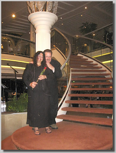 Dennis and Ruthie on the dining room stairs on deck 5 about to go up to deck 6 for dinner. This was the last photo taken of us as boyfriend and girlfriend because 5 minutes later I asked her to marry me and spend the rest of her life with me.