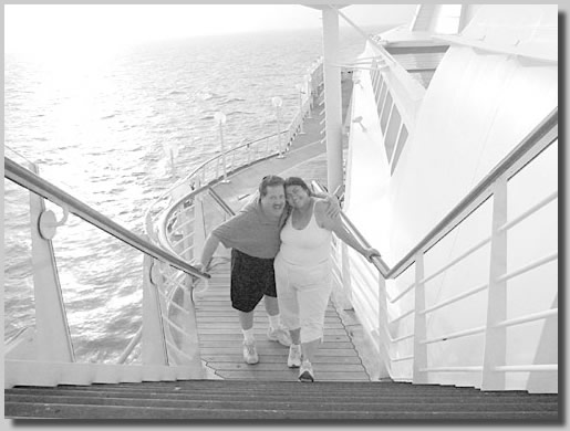 Dennis and Ruthie posing on Deck 10 very early in the morning when the ship was quiet and nobody was around.