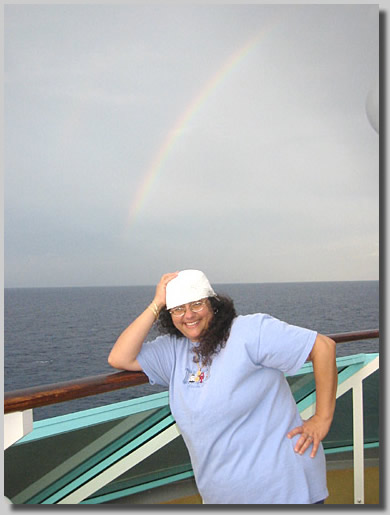 We had this short rainstorm one morning about 6am and after it this wonderful rainbow appeared so we could not resist popping off a few photos of it. Rooty Jr. really liked it! She had to have a few different poses with it.