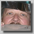 This is a silly shot of Dennis looking out from behind the steps on deck 4