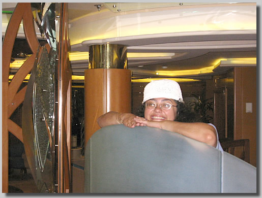 This is a shot of Ruthie looking out from behind a chair in the bar on deck 4.