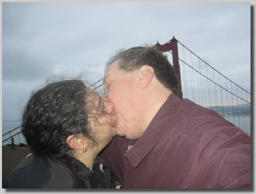 Rooty Jr. and Gush kissing above the Golden Gate Bridge very early in the morning! We got up to watch the sun rise from this spot a wedding photographer told us to go to above the bridge for a spectacular view...and it was...incredibly windy and cold as well.