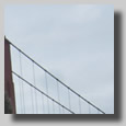 Rooty Jr. and Gush kissing above the Golden Gate Bridge very early in the morning! We got up to watch the sun rise from this spot a wedding photographer told us to go to above the bridge for a spectacular view...and it was...incredibly windy and cold as well.