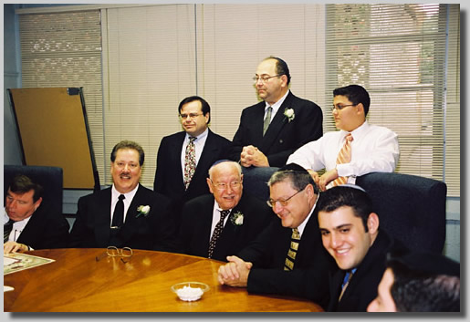 The men around the round table doin' bizness.