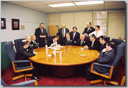 The men around the round table doin' bizness.
