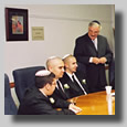 The men around the round table doin' bizness.