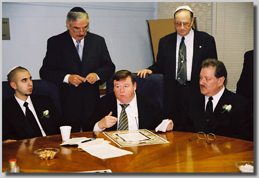 The men around the round table doin' bizness.