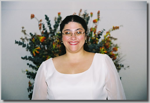 Rooty Jr. in the bridal dressing room looking just beautiful and radiant in her great wedding dress.