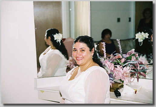 Rooty Jr. in the bridal dressing room looking just beautiful and radiant in her great wedding dress.