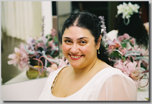 Rooty Jr. in the bridal dressing room looking just beautiful and radiant in her great wedding dress.