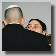 This is the wedding Processional with Rooty Jr. as she is escorted in by Fortuna and Isaac, her parents. She is being kissed by Josh.