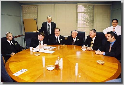 The men around the round table doin' bizness.